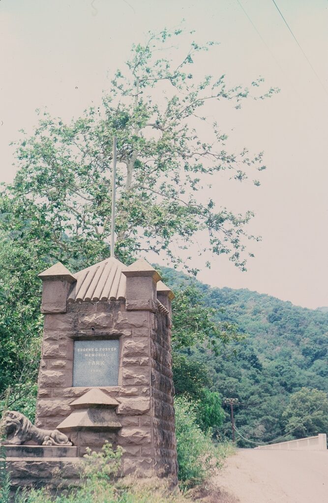 Foster Park entrance marker with stone architecture.