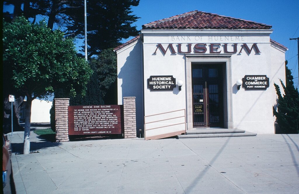 Hueneme Bank Building in 1981 with historical and Chamber of Commerce signage visible.